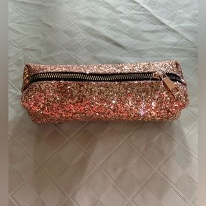 Gold glitter pencil/makeup case.